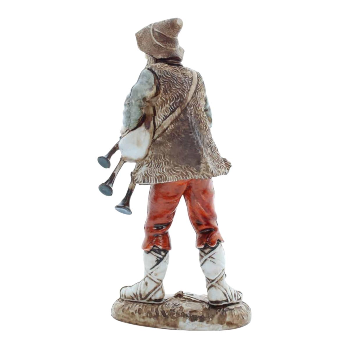Statua presepe 12 cm zampognaro che suona la zampogna