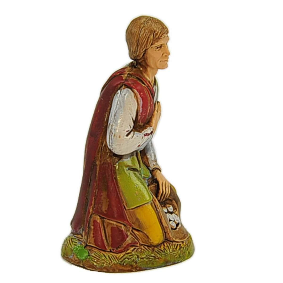 Statua presepe 10 cm contadino in ginocchio cesta di uova
