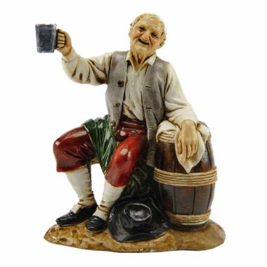 Statua presepe 12 cm pastore seduto botte calice
