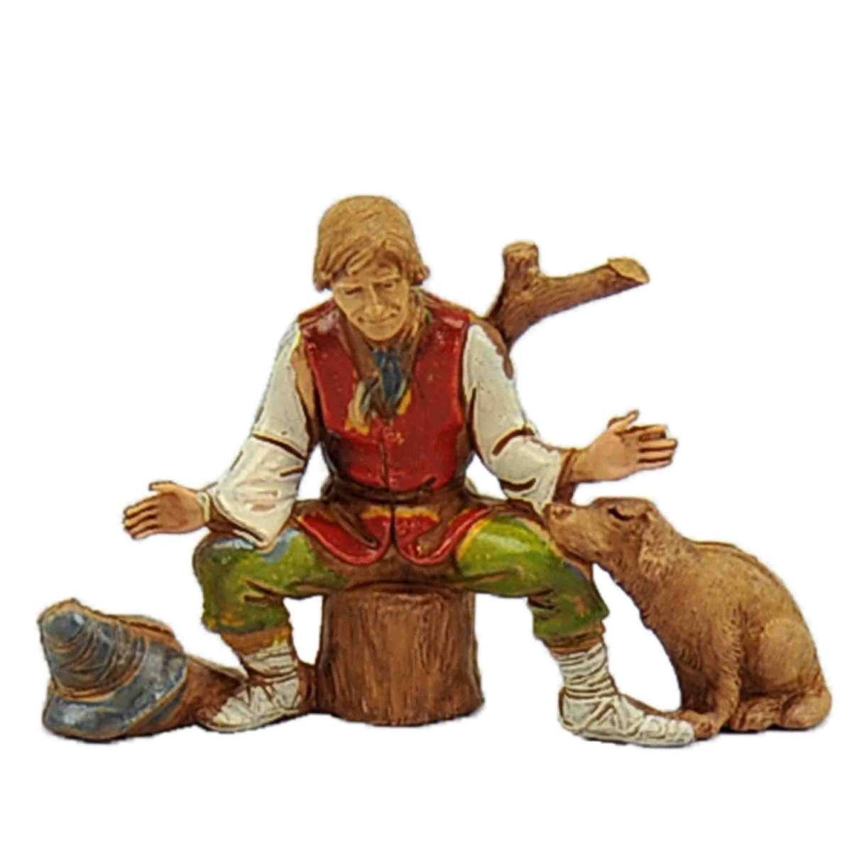 Statua presepe 10 cm pastore seduto sul tronco cane