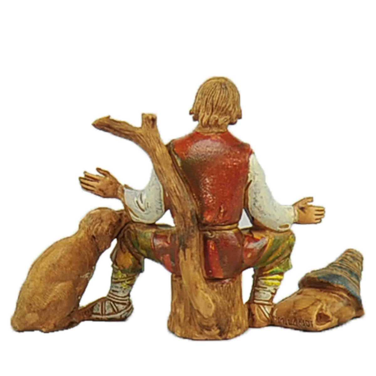 Statua presepe 10 cm pastore seduto sul tronco cane