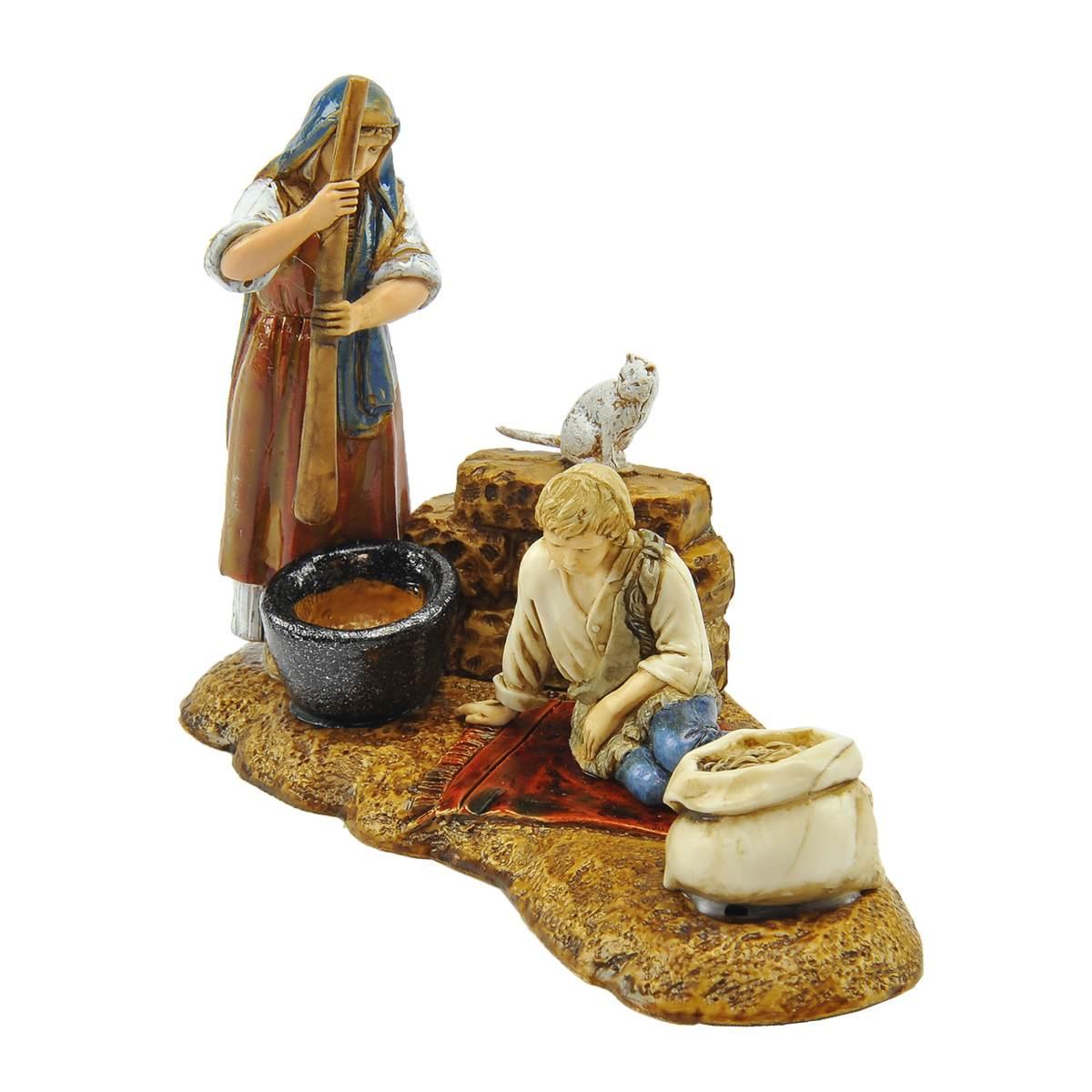 Statua presepe 10 cm donna bambino su tappeto
