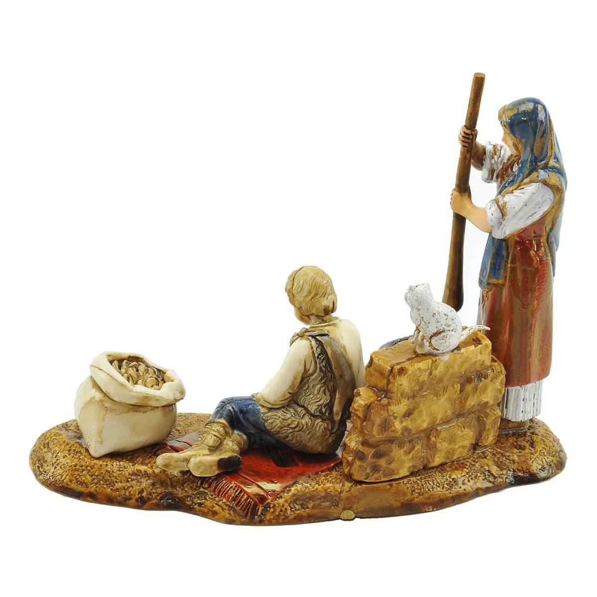 Statua presepe 10 cm donna bambino su tappeto