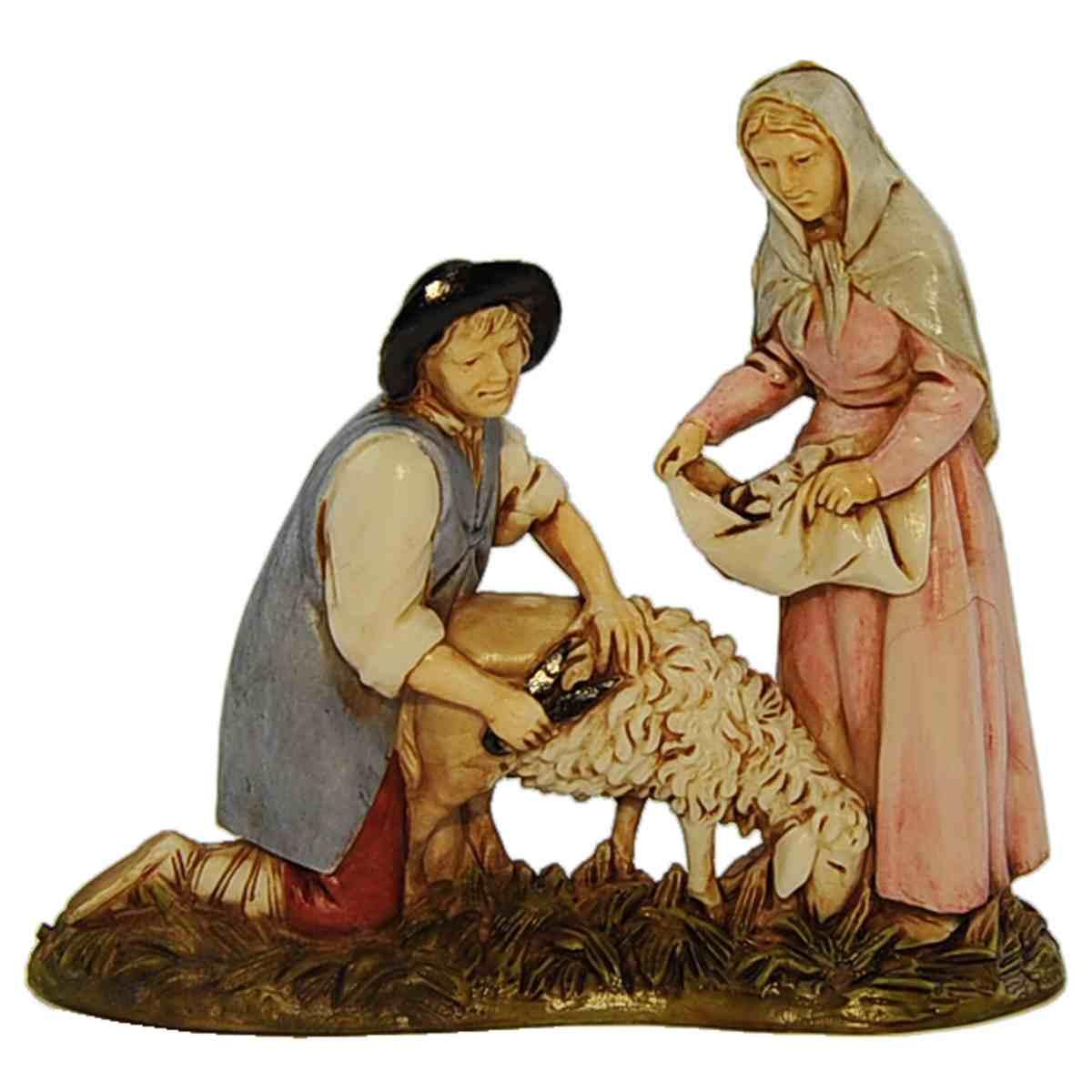 Statua presepe 8 cm pastore donna alla tosatura
